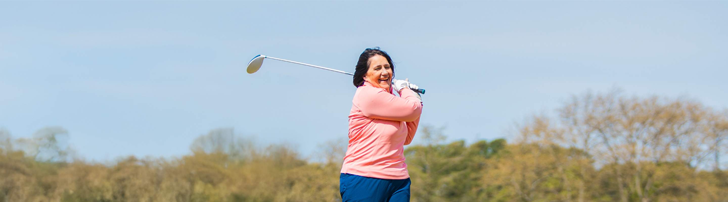 Woman playing golf